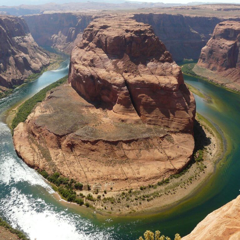 Stunning aerial view of Horseshoe Bend, Arizona with the Colorado River carving through the canyon.